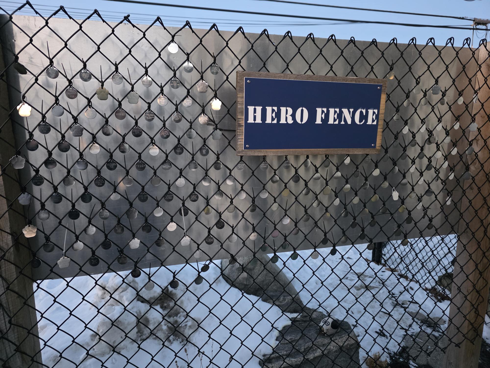 Hero Fence memorial dog tags honoring loved ones at the Humane Society of Monroe County